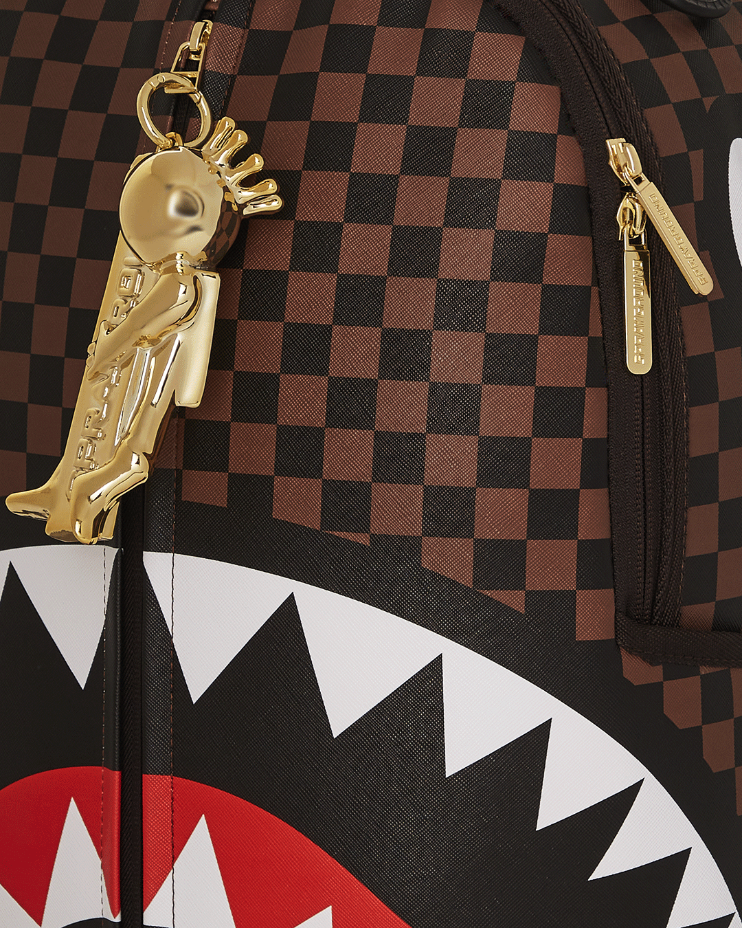 SPRAYGROUND® BACKPACK ASTROMANE AS THE WORLD'S LARGEST ZIPPER PULLEY